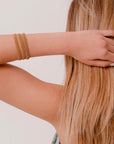bracciale argento tre nastri sottili passamaneria made in italy sabbia beige indossato
