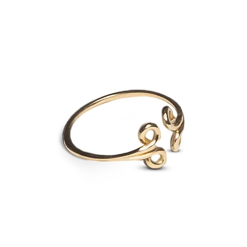 sottile anello oro giallo aperto ghirigori fatto a mano italia